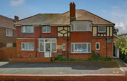 Exterior view of Amberley Lodge care home in Worthing