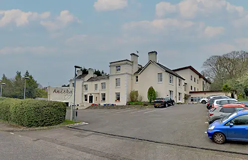 Exterior view of Aniska Lodge care home in Haywards Heath