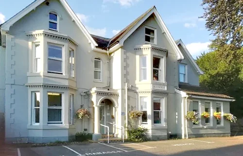 Exterior view of Heathfield care home in Horsham