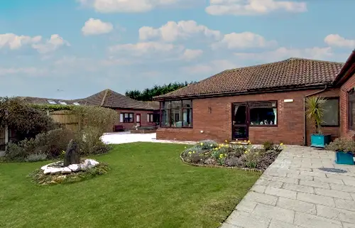Exterior view of Manorfield care home in Chichester