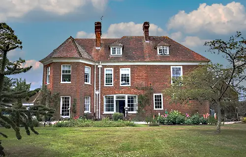 Exterior view of Nyton House care home in Chichester