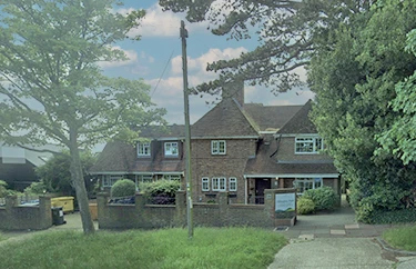 Exterior view of Offington Park care home in Worthing