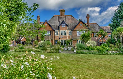 Exterior view of Pendean House care home in Midhurst