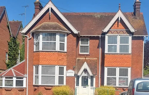 Exterior view of Rosedale care home in Horsham