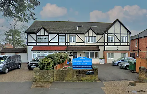 Exterior view of The Cedars care home in Ashford