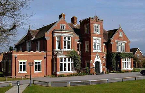 Exterior view of Wellcross Grange care home in Horsham